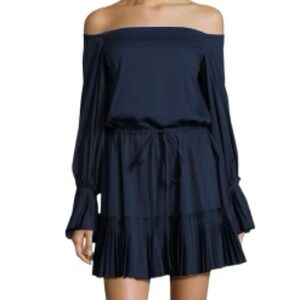 Alexis Rylan pleated off the shoulder mini dress